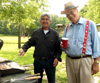 Jorge grilling sausages